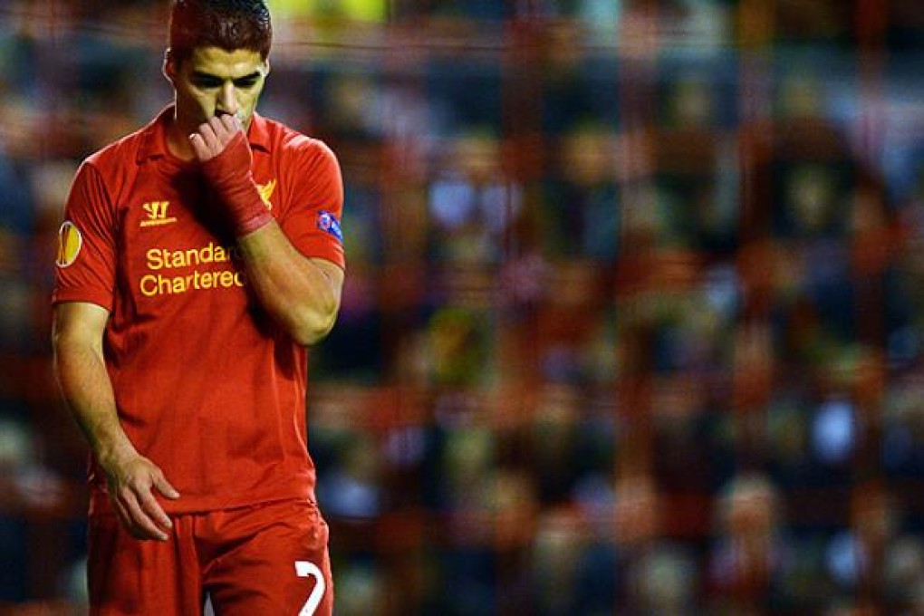 Liverpool's Luis Suárez reacts after losing to Udinese at Anfield. Photo: AFP