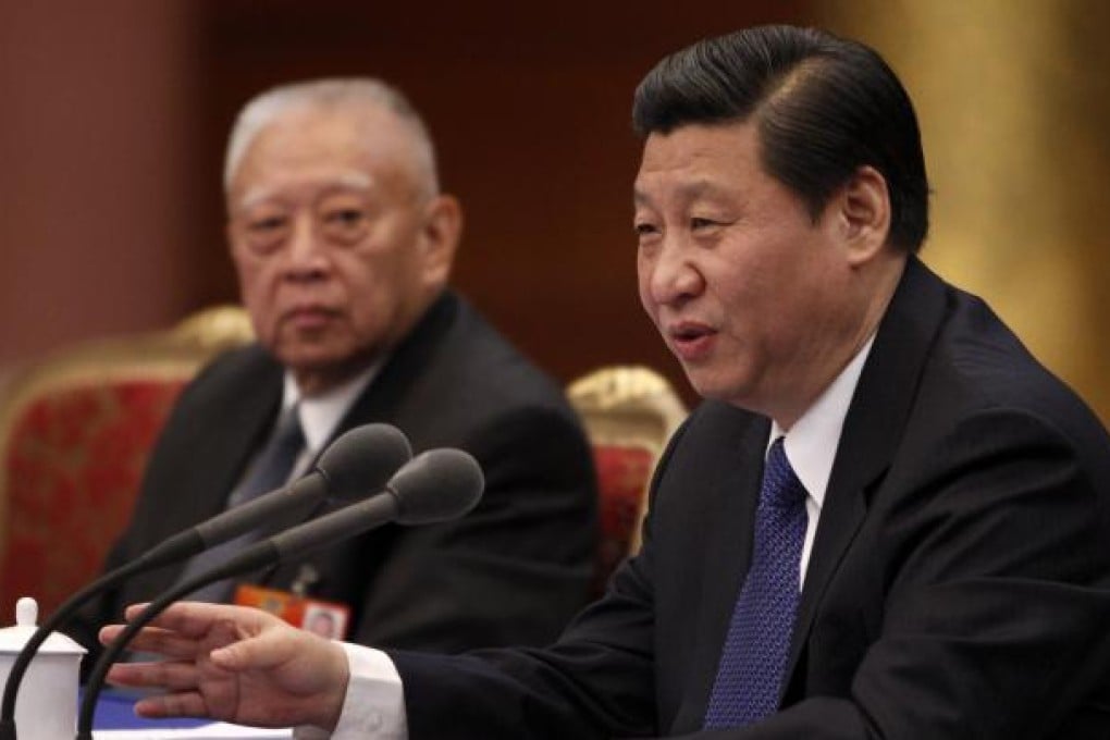Chinese vice president Xi Jinping, right, and former Hong Kong Chief Executive Tung Chee-Hwa, left, meet with the Hong Kong delegation to the National People's Congress in Beijing in this March 4, 2012 file photo. Photo: SCMP