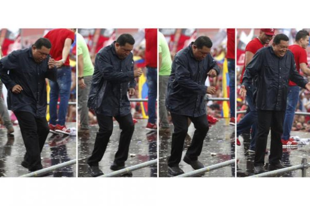 Hugo Chavez dances in the rain before a large crowd on the final campaign day before tomorrow’s presidential vote. Photo: Reuters