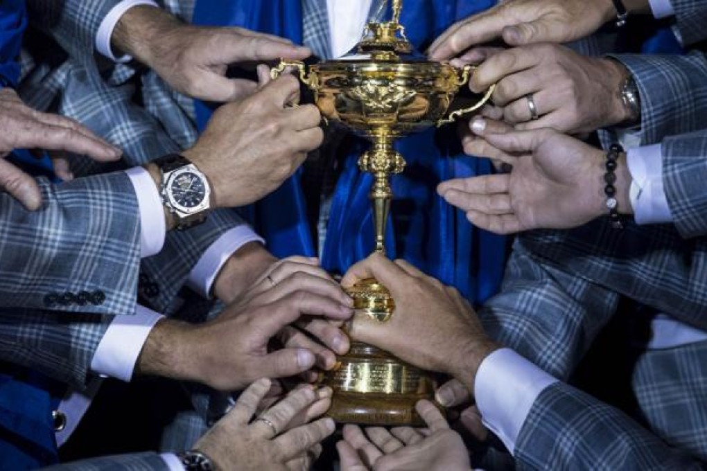 Members of Team Europe hold the Ryder Cup after the final day of the 39th Ryder Cup at the Medinah Country Club September 30, 2012 in Medinah, Illinois. Photo: AFP