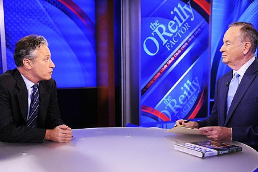 Jon Stewart (left) appears on Bill O'Reilly's show on Fox News in 2010. They held a mock debate on Saturday, bantering about birth control and former US president George W Bush. Photo: AP