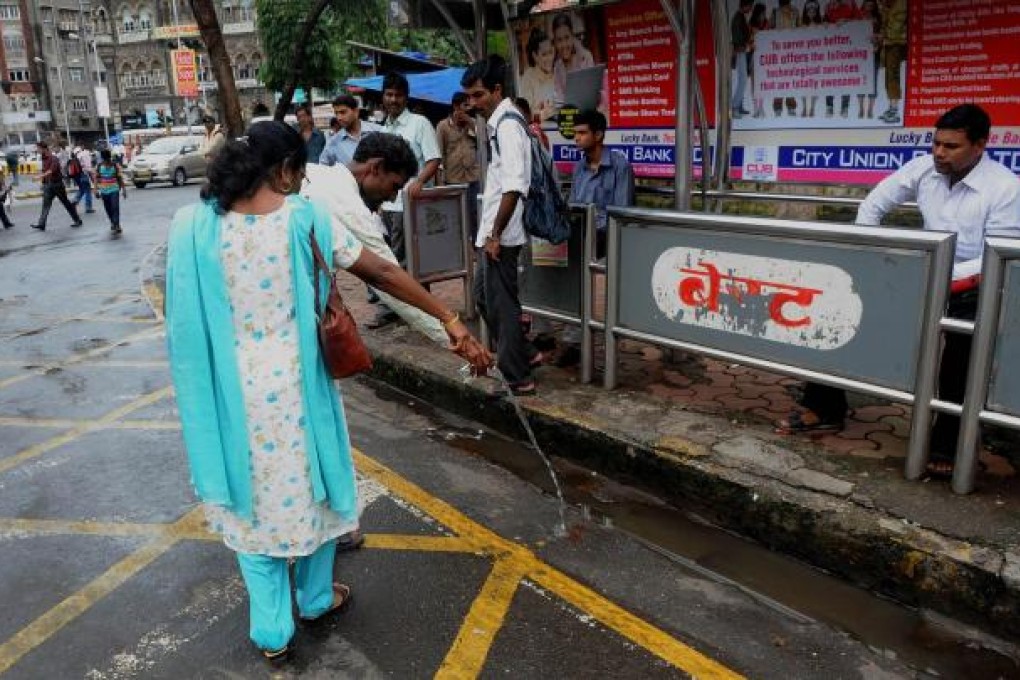 Nuisance detector Rajeshree Rajaram Kamble in action. Photo: AFP