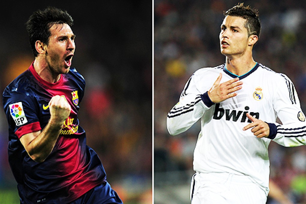 Lionel Messi (left) and Cristiano Ronaldo on Sunday. Photo: AFP
