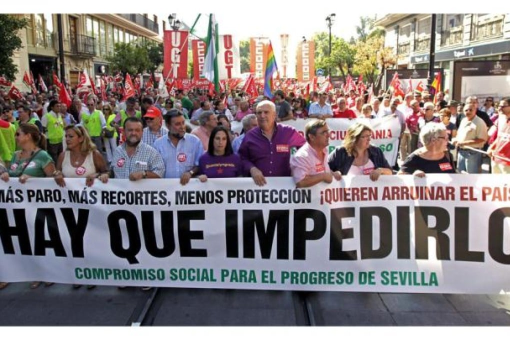 Thousands protest yesterday against the government's austerity measures in Seville, southern Spain. Photo: EPA