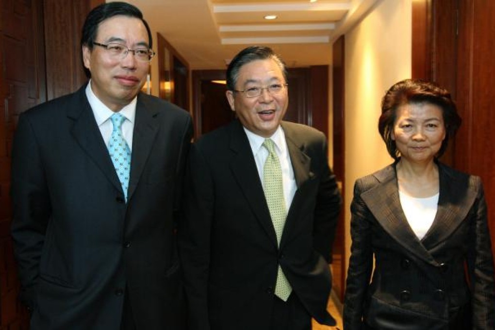 Andrew Leung Kwan-yuen (left)