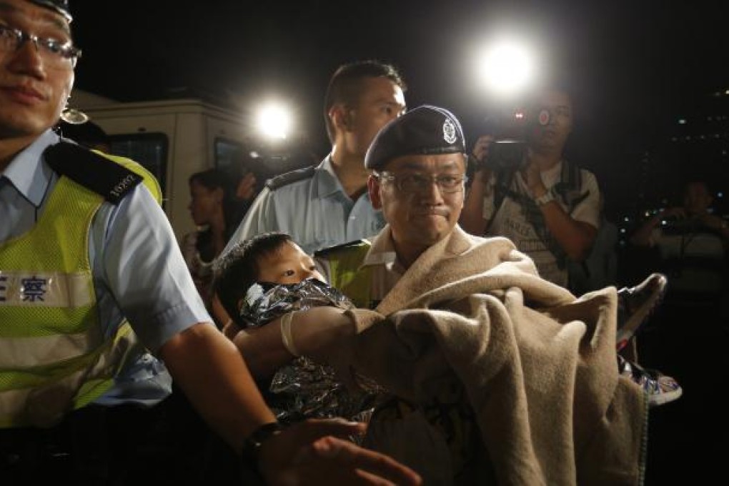 TV and camera crews arrive at the scene of the rescue.  Photo: AP