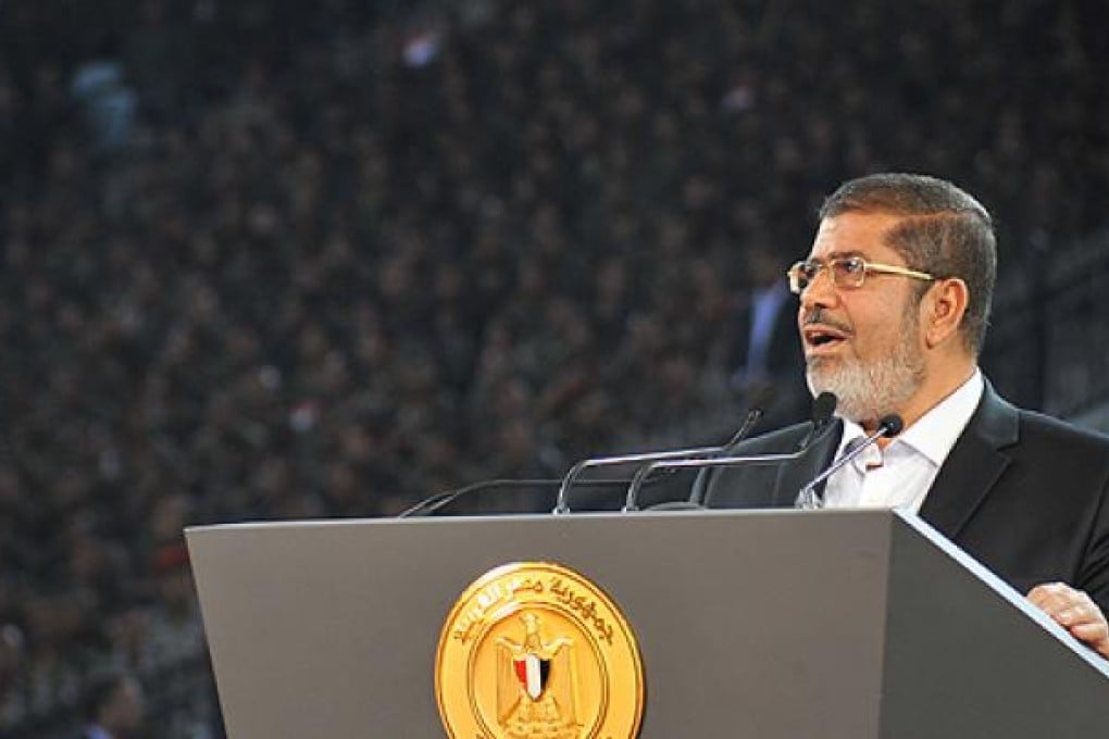 Egypt President Muhammed Mursi delivers a speech in Cairo on Sunday. Photo: AFP