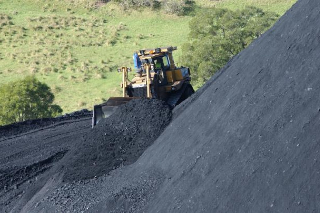 BHP to axe iron ore jobs as slowdown bites