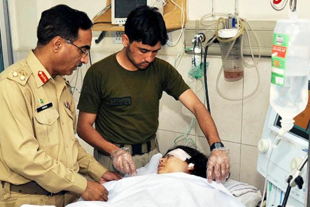 Army doctors in Peshawar treat teenage activist Malala Yousafzai after she was shot by the Taliban in the Swat Valley on Tuesday. Photo: EPA