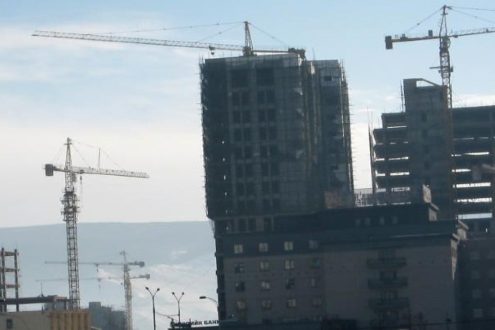 Cranes dot the skyline in Ulan Bator, where double-digit economic growth has helped the resource-rich country weather the global financial crisis. Photo: SCMP