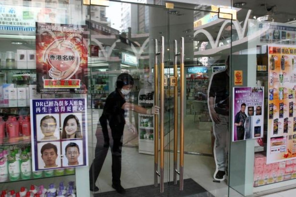 The DR Esthetic Centre in Yee Wo Street, Causeway Bay, open as usual yesterday. Photo: Nora Tam