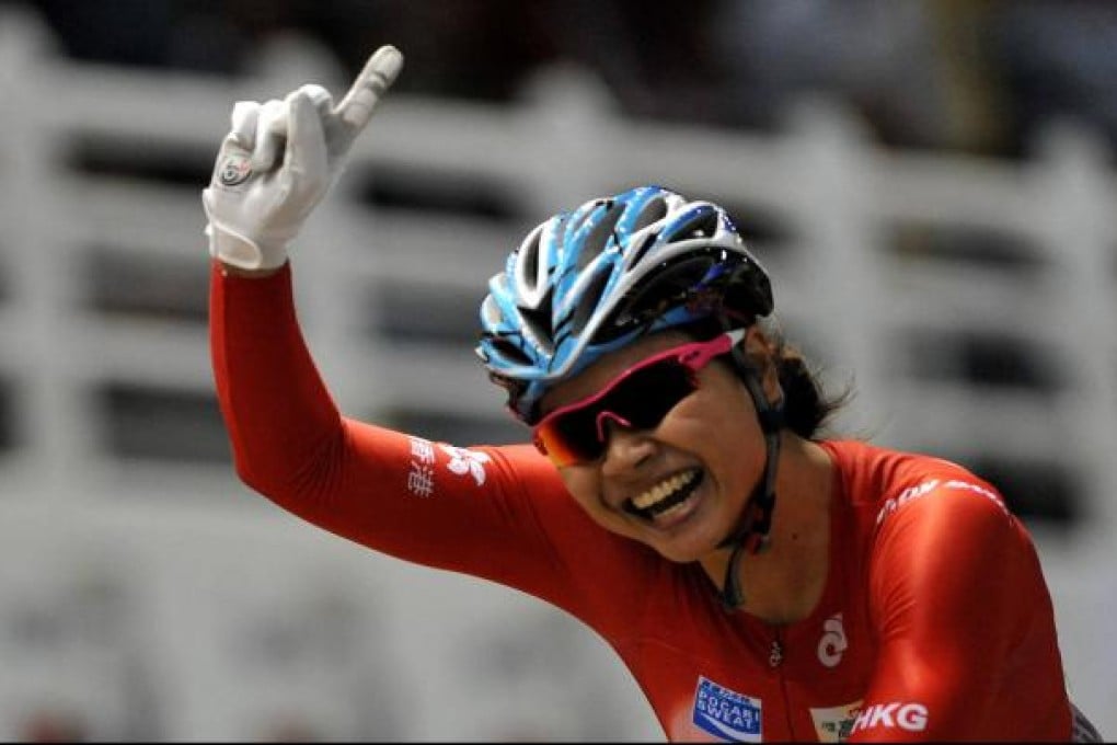 Hong Kong's Lee Wai-sze celebrates after winning the gold medal in the women's sprint at the World Cup in Cali, Colombia. Photo: AFP