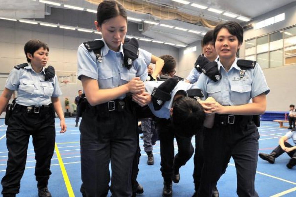 Officers from Tango company practise a crowd control drill. Photo: SCMP