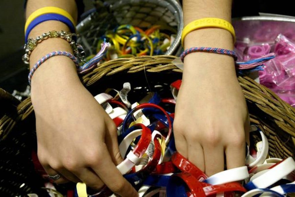 More than 80 million bracelets have been sold to support Lance Armstrong's charity to battle cancer. Photo: AFP