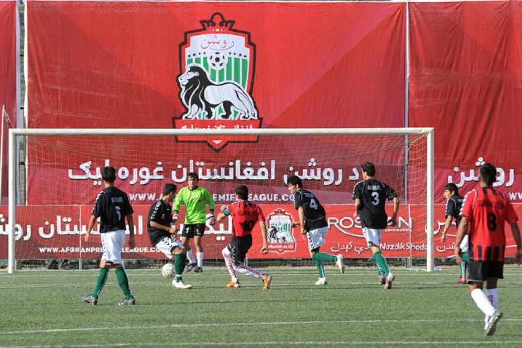 The first Afghan Premiere League football game at the Afghanistan Football Federation stadium in Kabul. Photo: AFP