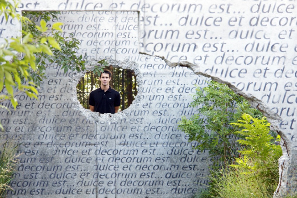 James Basson with his creation, Dulce et Decorum est, for the Gardening World Cup, at the Huis Ten Bosch theme park, Japan. Photos: Scape Design; Huis Ten Bosch