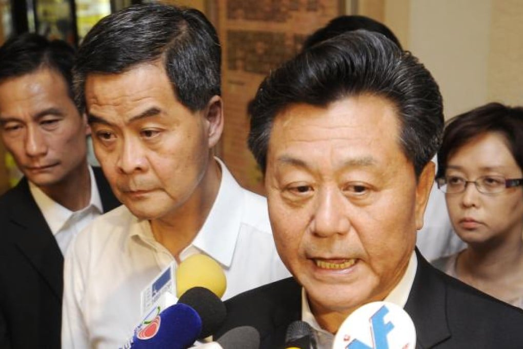 In a move that hit a raw nerve among many, Li Gang speaks to the press ahead of Leung Chun-ying. Photo: SCMP