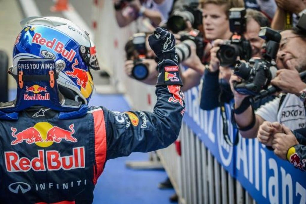 Red Bull's double world champion, Sebastian Vettel, celebrates after winning the Korean Grand Prix yesterday at Yeongam yesterday. Photo: AFP