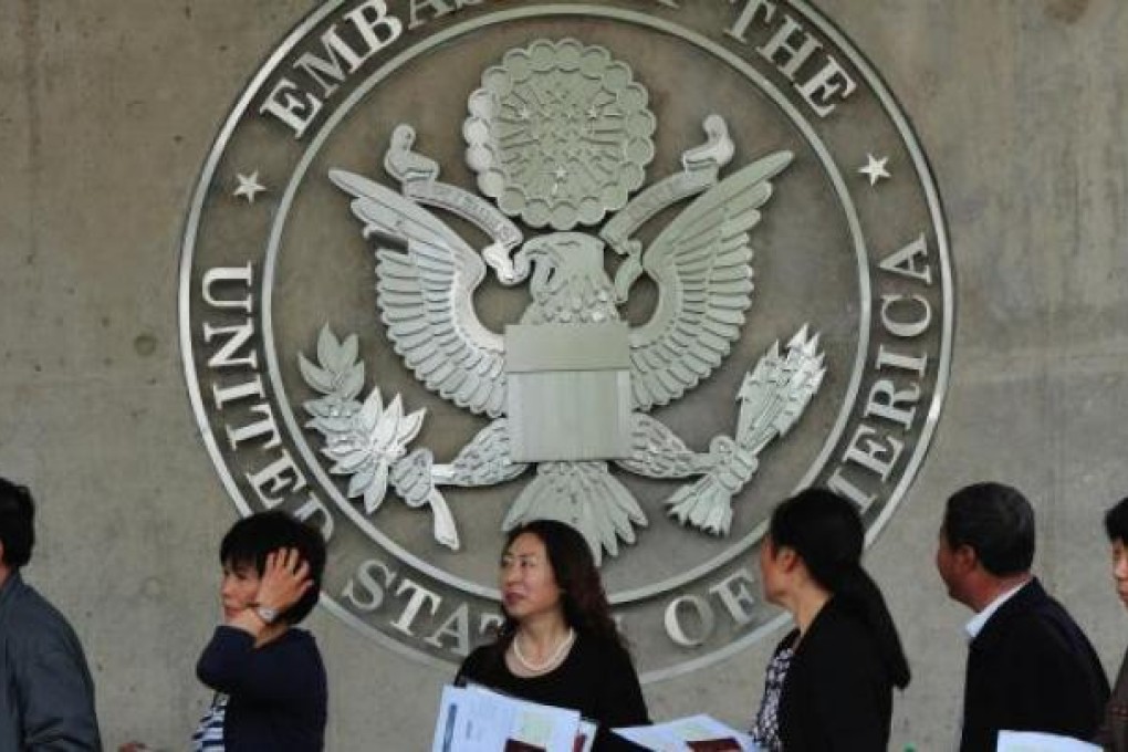 Chinese citizens in line to submitt US visa application outside the U.S. Embassy in Beijing. Photo: AFP