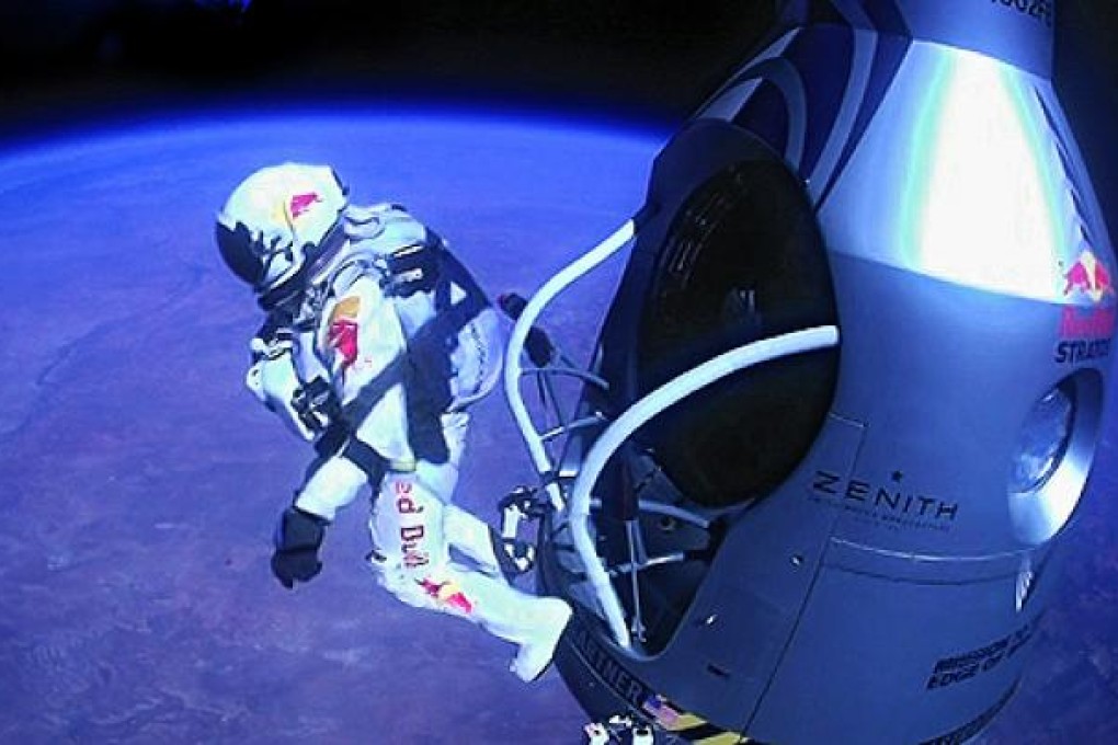 Felix Baumgartner jumps out of his capsule from more than 39 kilometres above the earth. Photo: AP