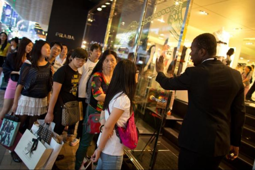 China's urban population is expected to be a nearly quarter of the population in 2020, helping push up demand for consumer goods. Photo: Bloomberg