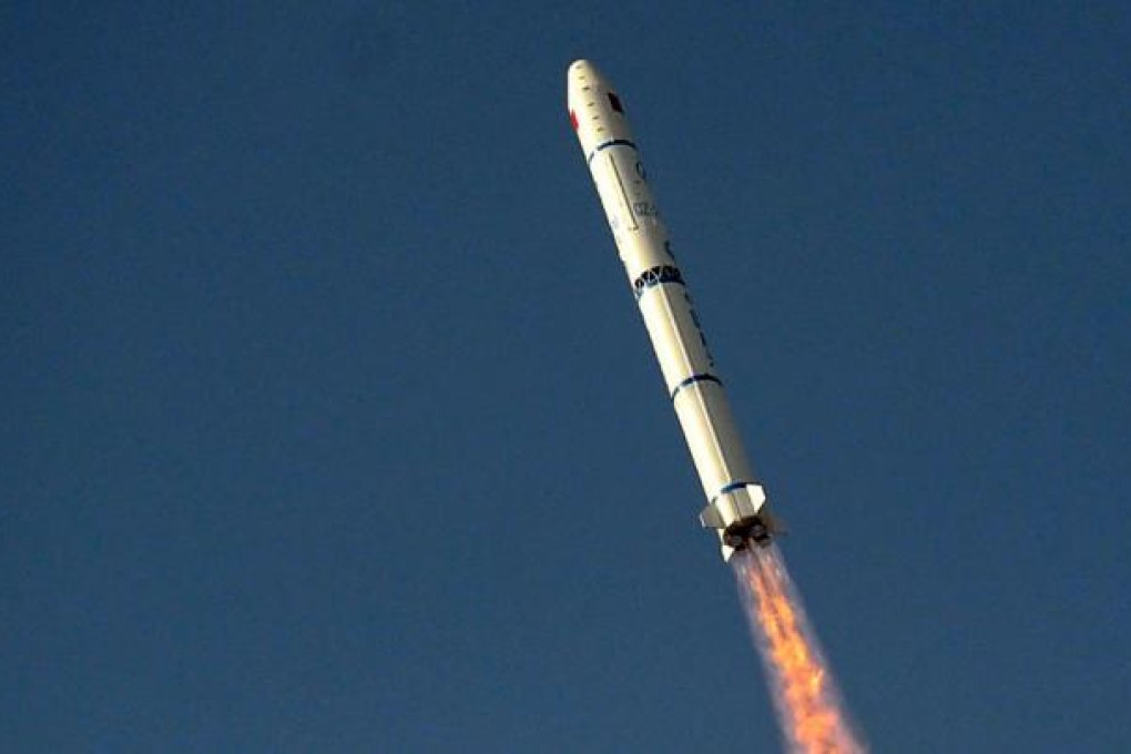 A Long March 2C carrier rocket transporting two satellites blasts off from Taiyuan, Shanxi province on Sunday. Photo: Xinhua