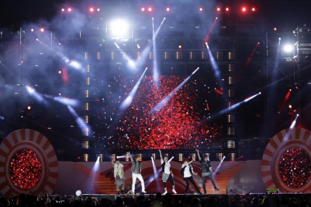South Korean K-Pop boy band SHINee wow fans during a concert in Incheon. They will perform in Hong Kong on October 27