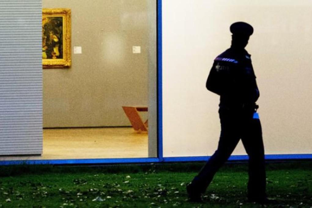 The white spot on the wall marks the gap left by one of the stolen paintings in the Kunsthal museum, Rotterdam, on Tuesday. Photo: EPA