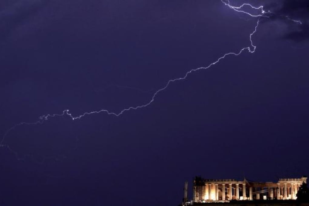 New storm clouds are brewing over Greece. Photo: EPA