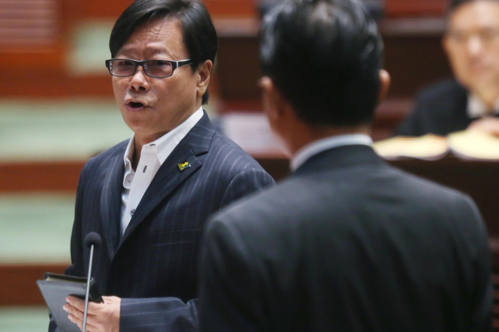 Wong Yuk-man retakes his oath yesterday. Photo: David Wong