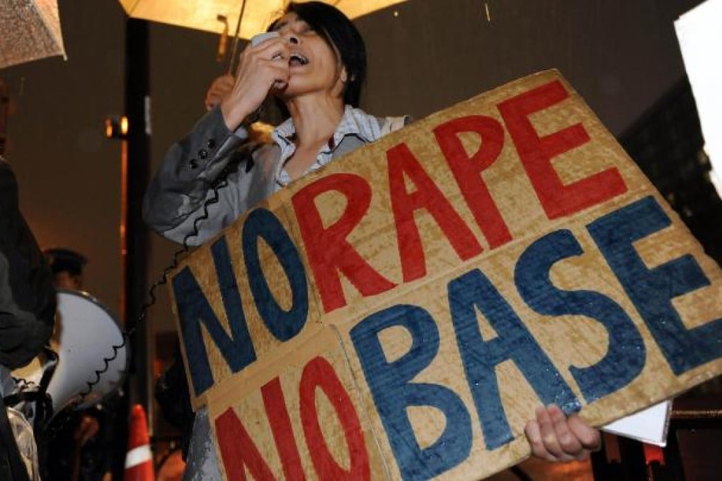 Angry Japanese react to the incident in Okinawa. Photo: AFP