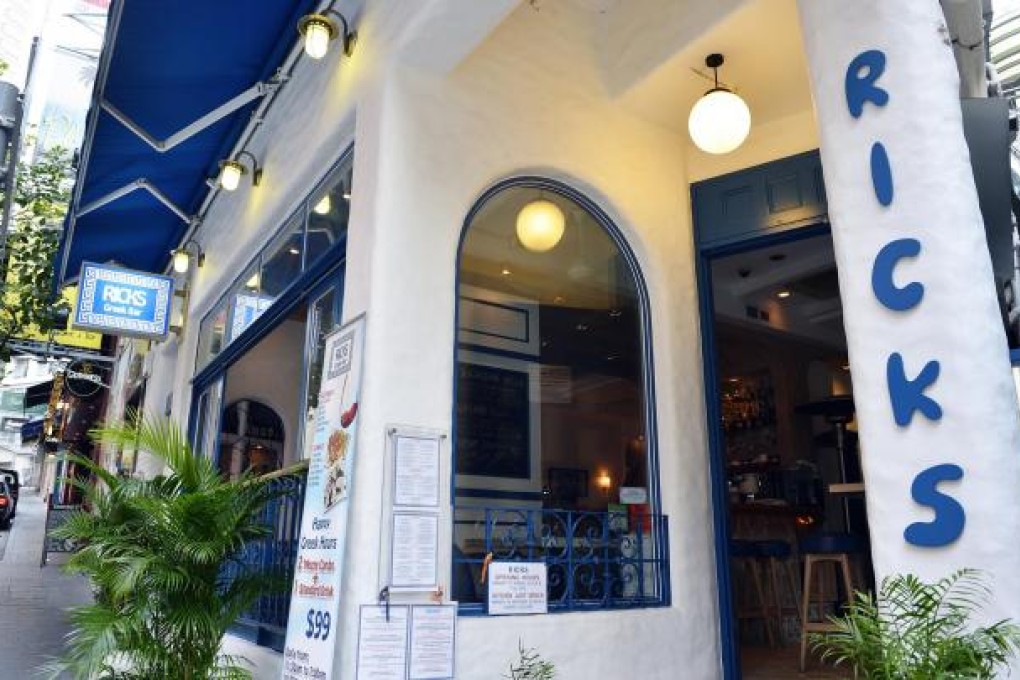 The classic blue and white exterior of Ricks Greek Bar, in SoHo. Photos: Warton Li