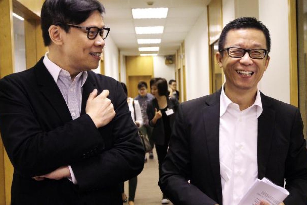City Telecom chairman Ricky Wong Wai-kay (right) meets the media with Commercial Radio chief executive Stephen Chan Chi-wang yesterday. Photo: Edward Wong