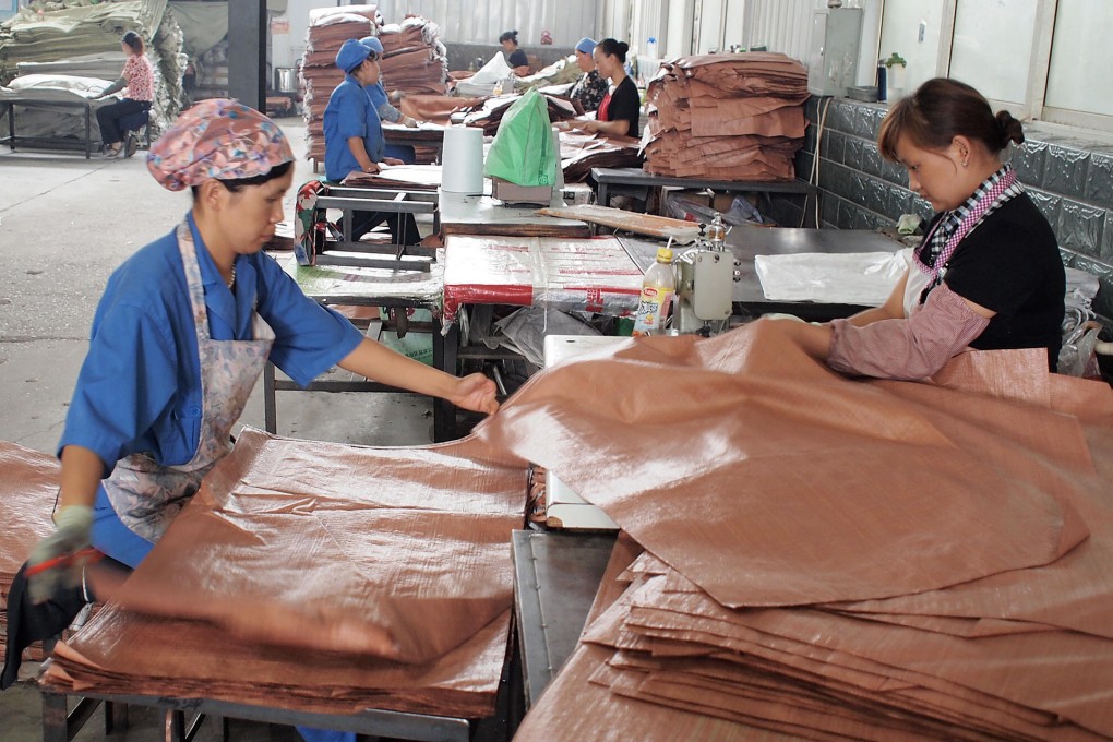 A bag factory in Wuzhong that has earned the status of a 'charitable business' by hiring the disabled. Photo: SCMP