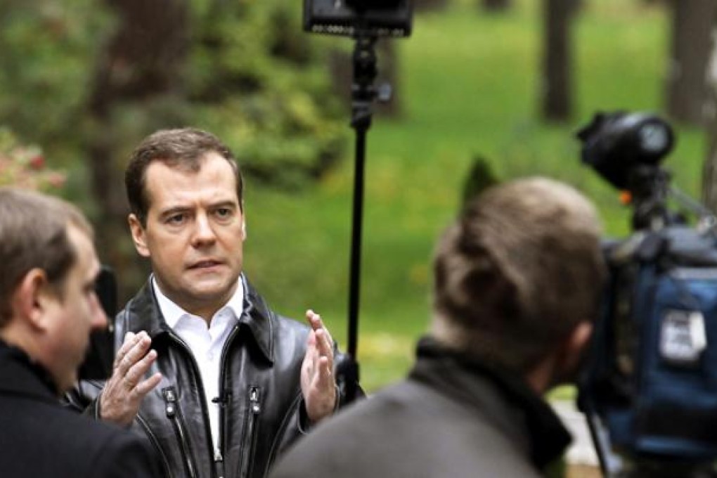 Russia's Prime Minister Dmitry Medvedev records a message on his video blog  in Moscow on October 12. Photo: AFP