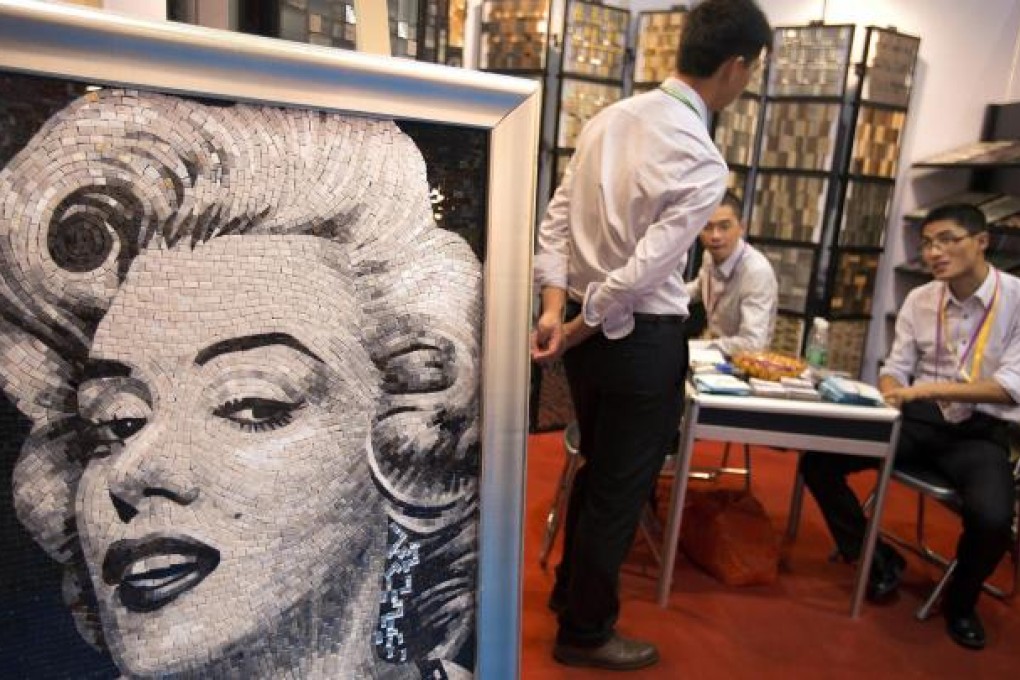 A mosaic image of Marilyn Monroe on display at the Canton Fair in Guangzhou. The mood of the fair activities is mixed. Photo: NYT