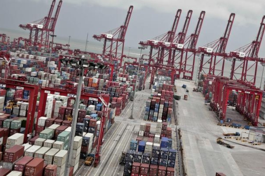 There are now three rail services a week taking containers like these in Shekou to Changsha with a 30-hour transit time. Photo: Bloomberg