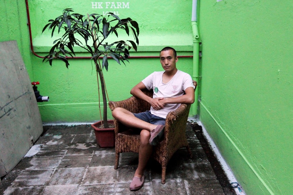 Michael Leung at his rooftop farm in Kwun Tong. Photo: Nora Tam