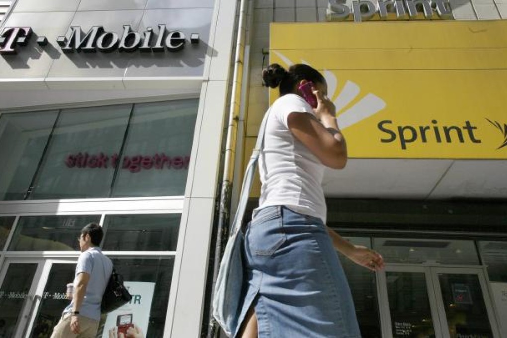 A woman uses her mobile phone in New York. Photo: Reuters