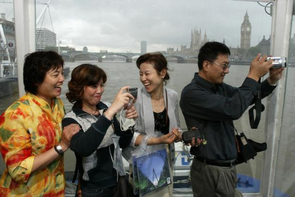 Chinese tourists on the Thames. Britain is among countries to have aggressively wooed Chinese travellers. Photo: Reuters