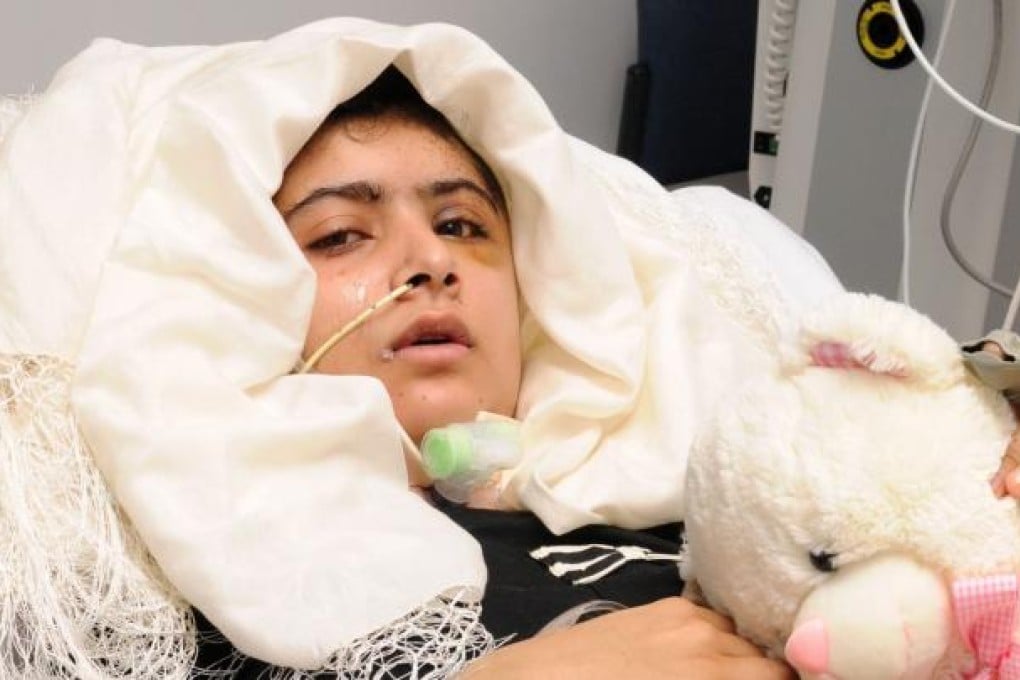 Pakistani schoolgirl Malala Yousafzai lying in her bed after receiving treatment at the Queen Elizabeth Hospital/University Hospitals in Birmingham on October 19, 2012. Photo: AFP