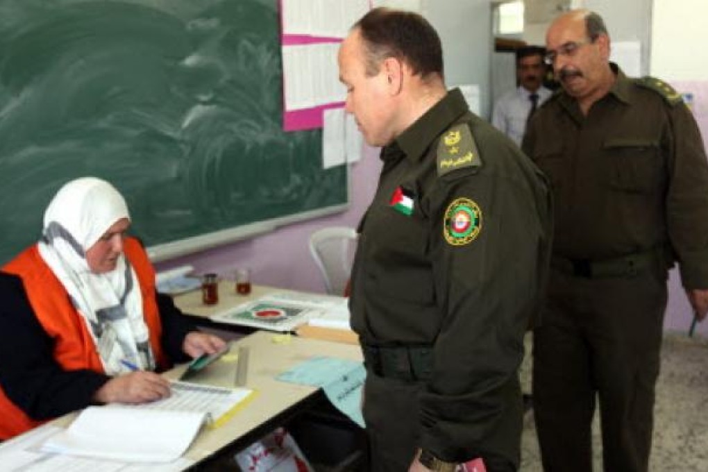 Palestinian police register to vote in the West bank city of Hebron. Photo: EPA
