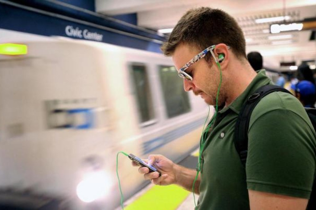 Most cellphone thefts happen on crowded trains and buses. People have been urged to 'be smart with your smartphone'. Photo: AP