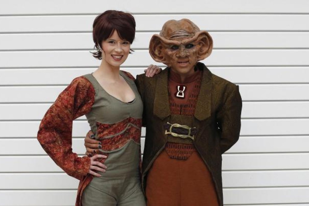 Silvana Gunther and Boris Murru of Berlin pose as they arrive at the convention in London at the weekend. Photos: Reuters