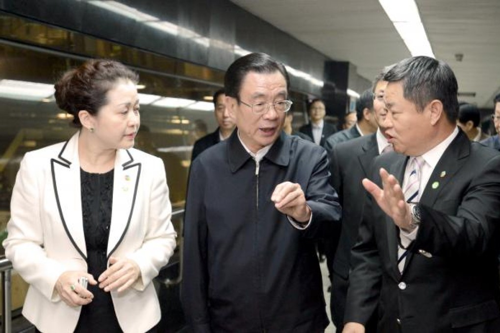 He Guoqiang (centre) called investigating corruption cases a "long-term task in the process of building a clean government". Photo: Xinhua