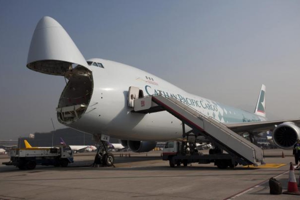 Cathay Pacific Cargo has recorded a drop in freight volumes but is unsure whether it is because of a shift to sea transport. Photo: Bloomberg
