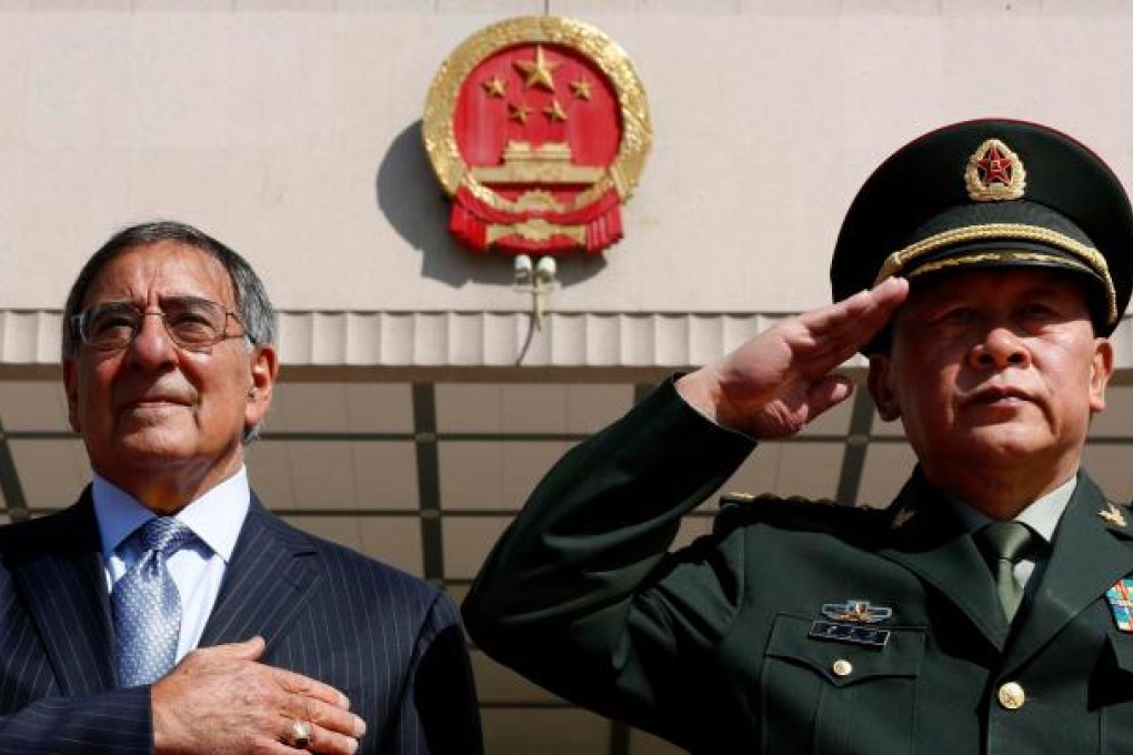 US Defense Secretary Leon Panetta (left) with China'a Defense Minister Liang Guanglie in Beijing.  Photo: AFP