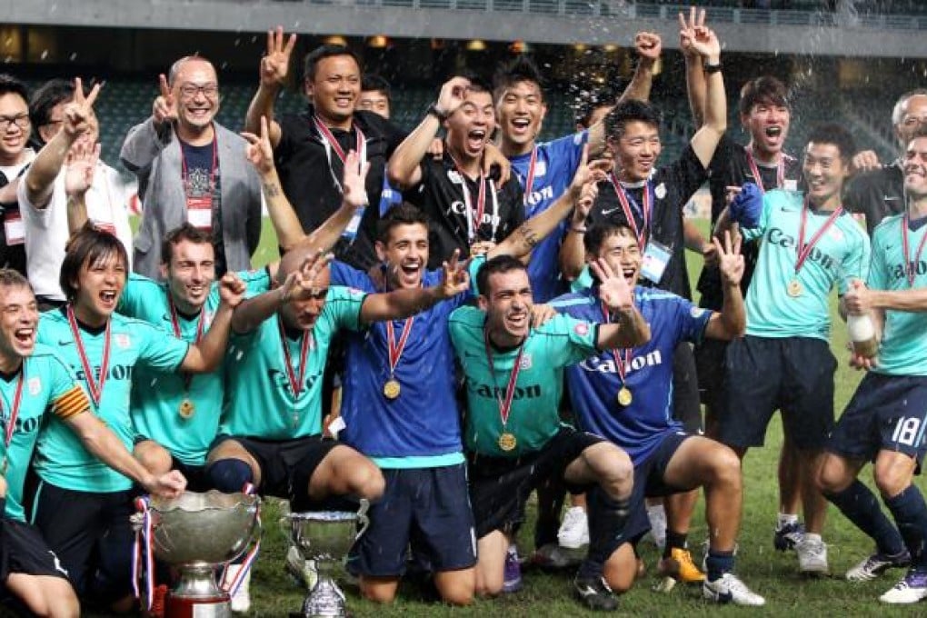 Kitchee players celebrate their winning at Football FA Cup final between TSW Pegasus and Kitchee at Hong Kong Stadium.
