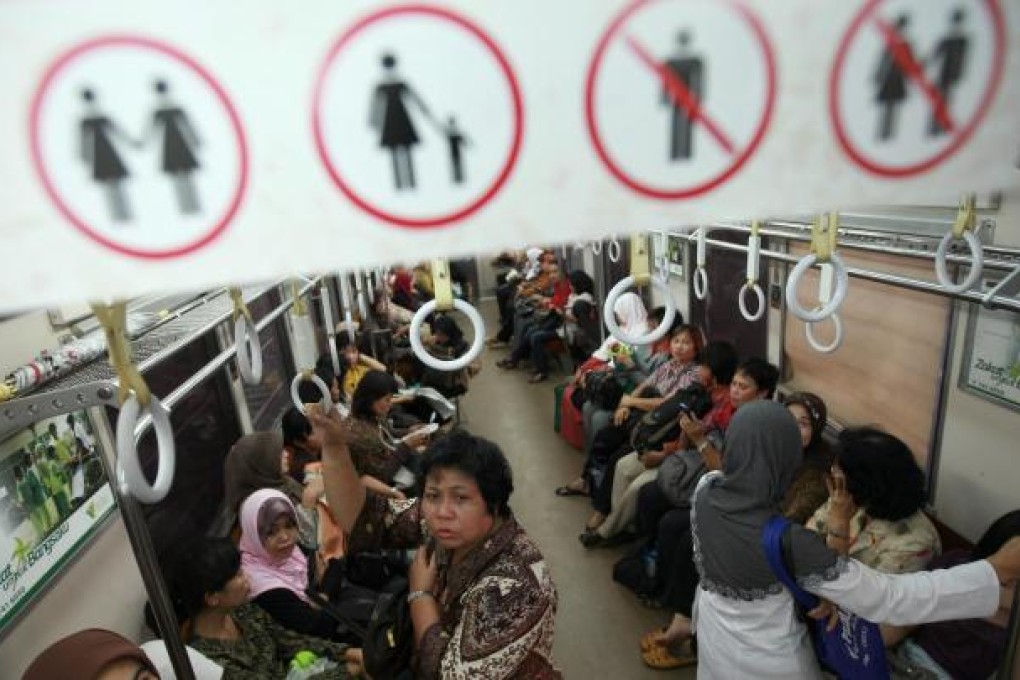 A women-only commuter carriage in Jakarta. Photo: EPA