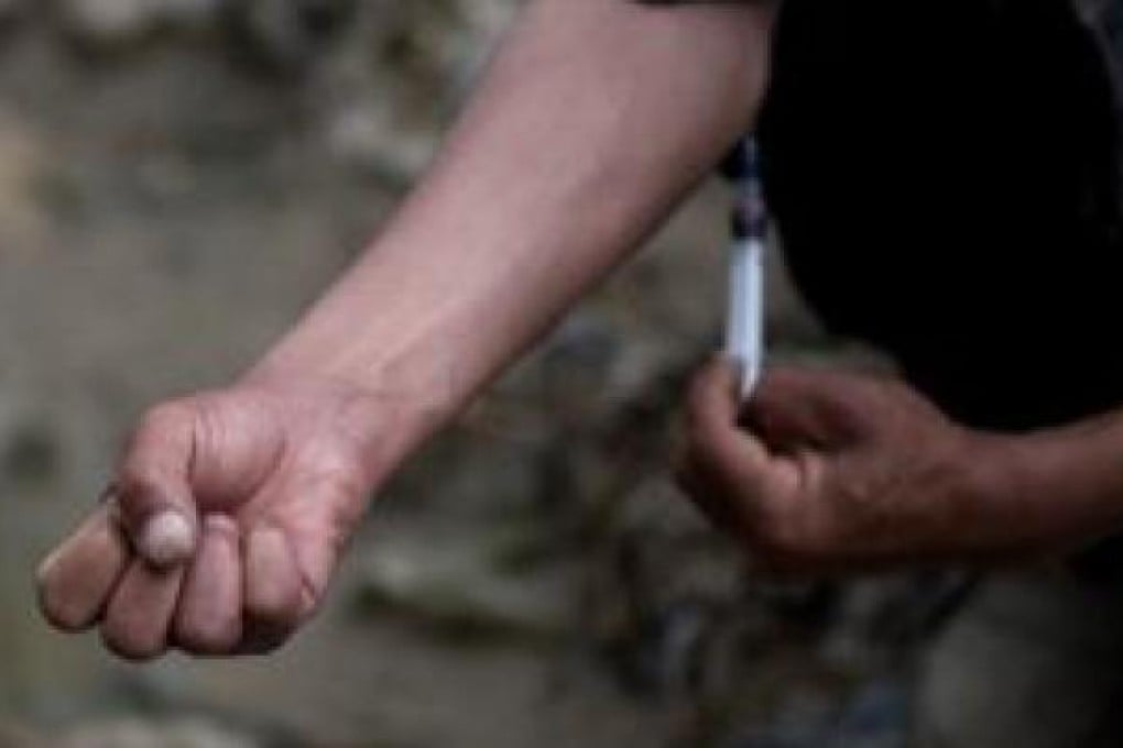 Shooting galleries would provide sterile needles and medical oversight for drug injectors. File photo: AFP